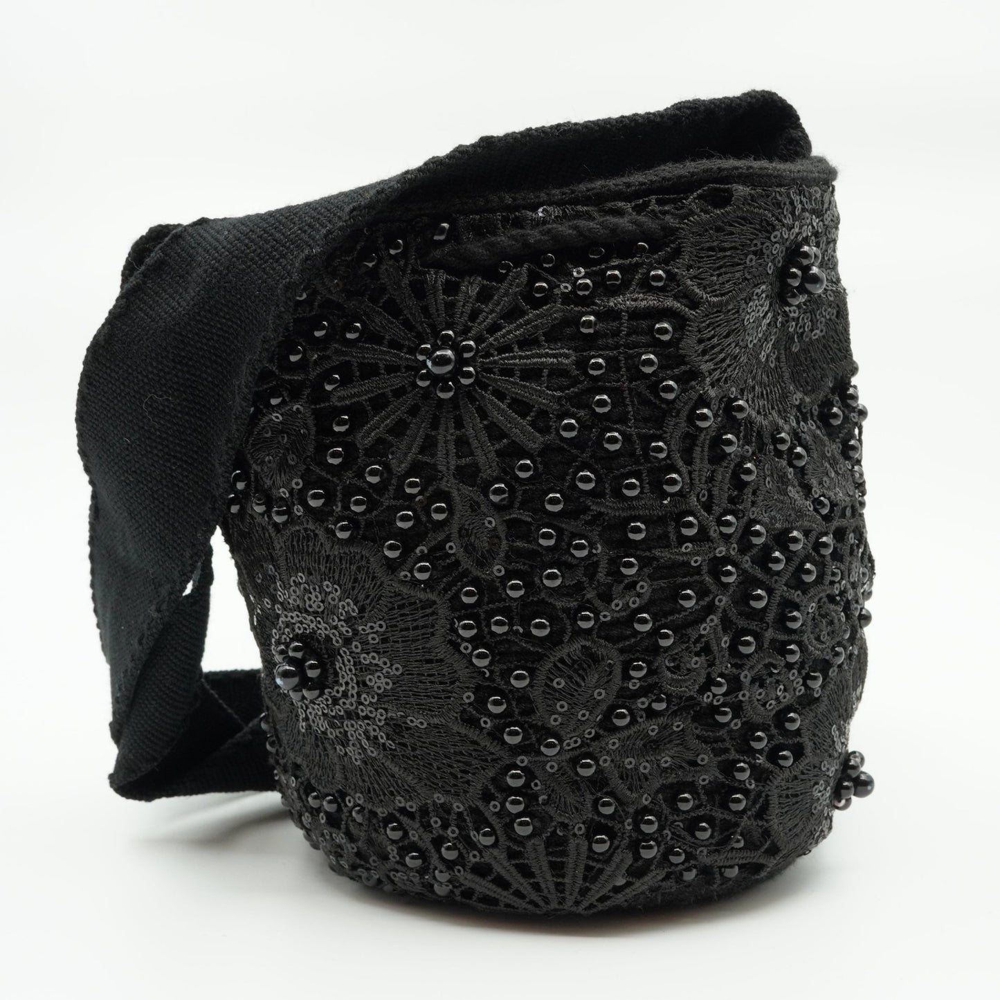 Black embroidered and beaded mochila purse.