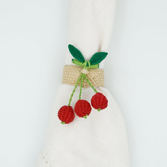 Overhead view of woven cherry napkin rings.