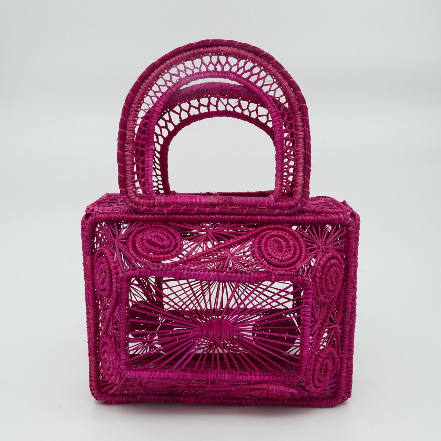 Direct view of woven fuchsia lunchbox purse.