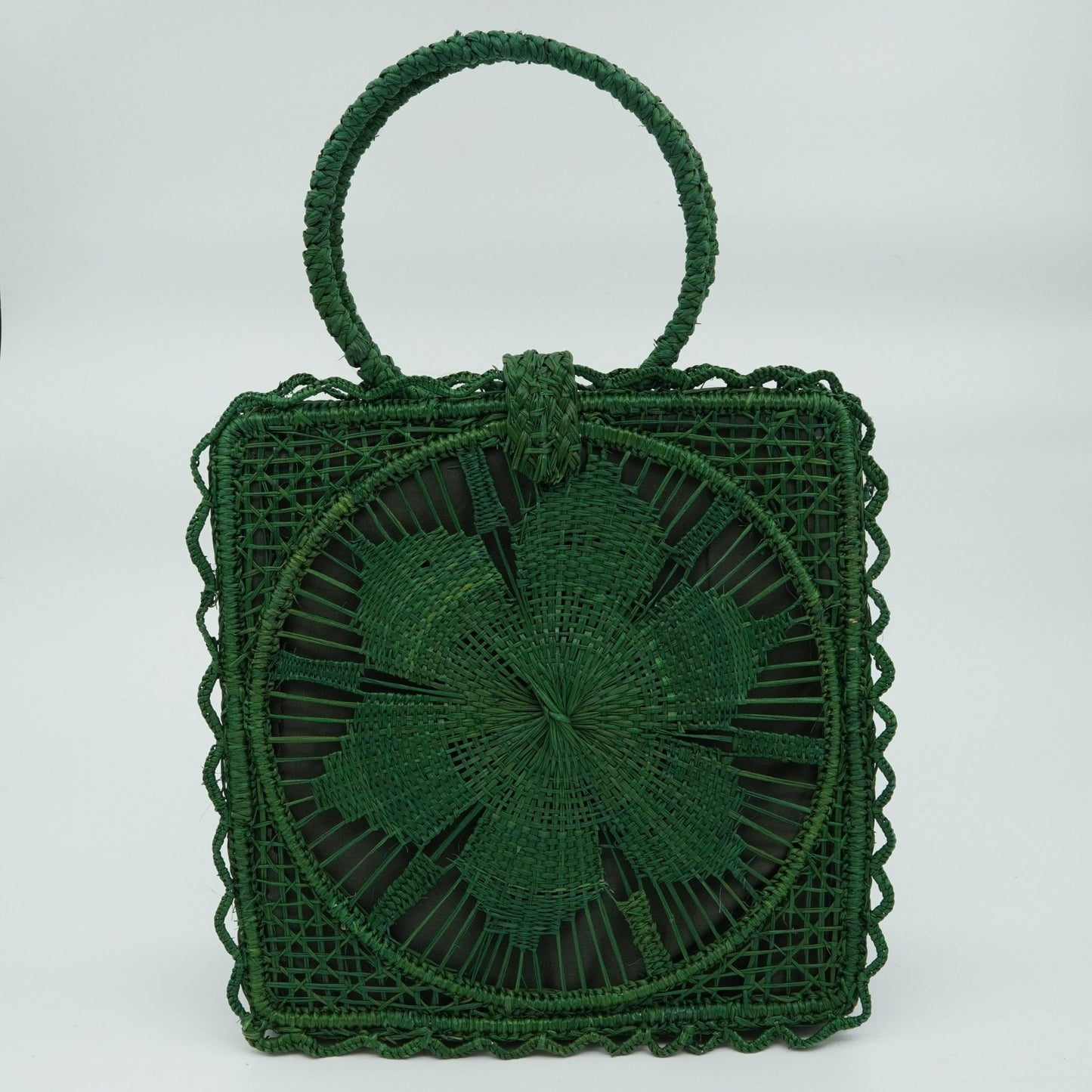 Green woven square flower purse.