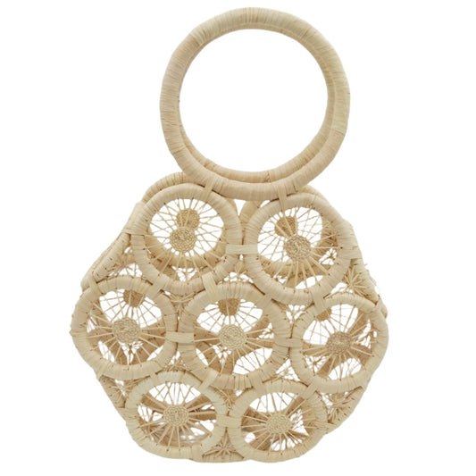 Woven hexagon purse with circle pattern.