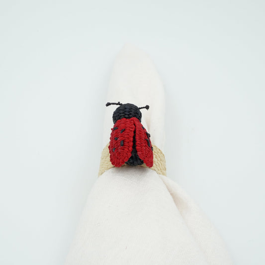 Head on view of woven ladybug napkin ring.