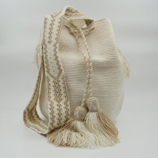 Large white mochila woven handbag with strap.