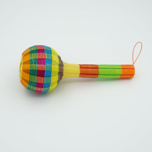 Profile view of a plastic woven medium-sized maraca.