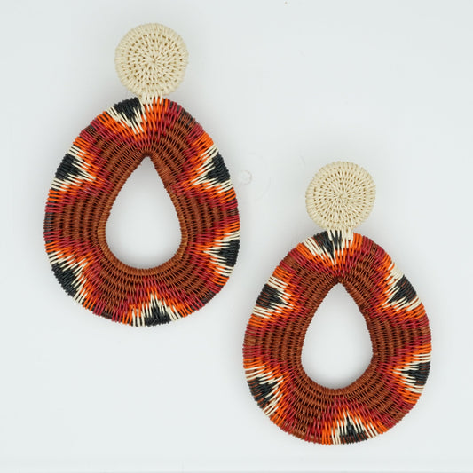 Overhead view of multicolor and copper werregue woven teardrop earrings.
