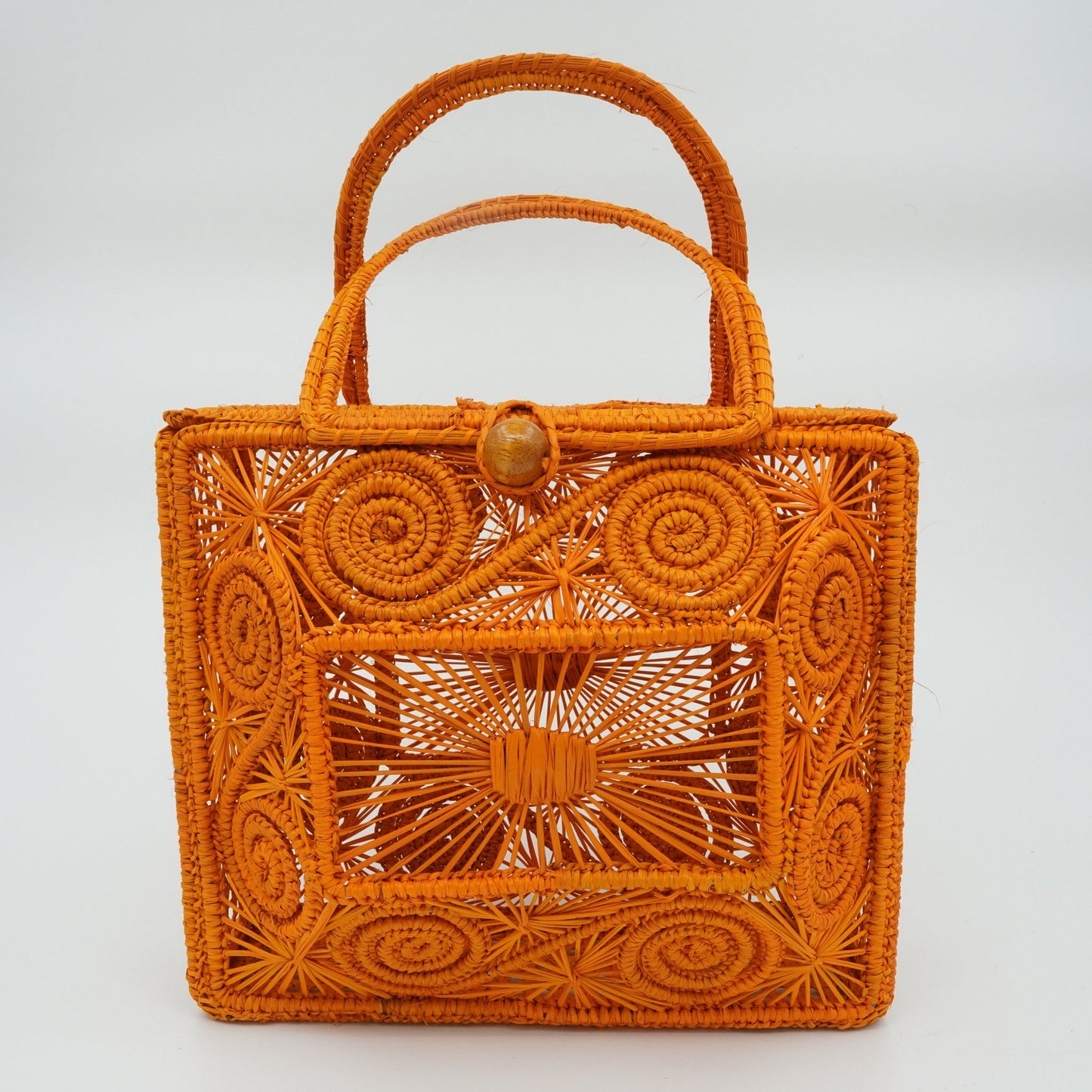 Direct view of woven mustard lunchbox purse.
