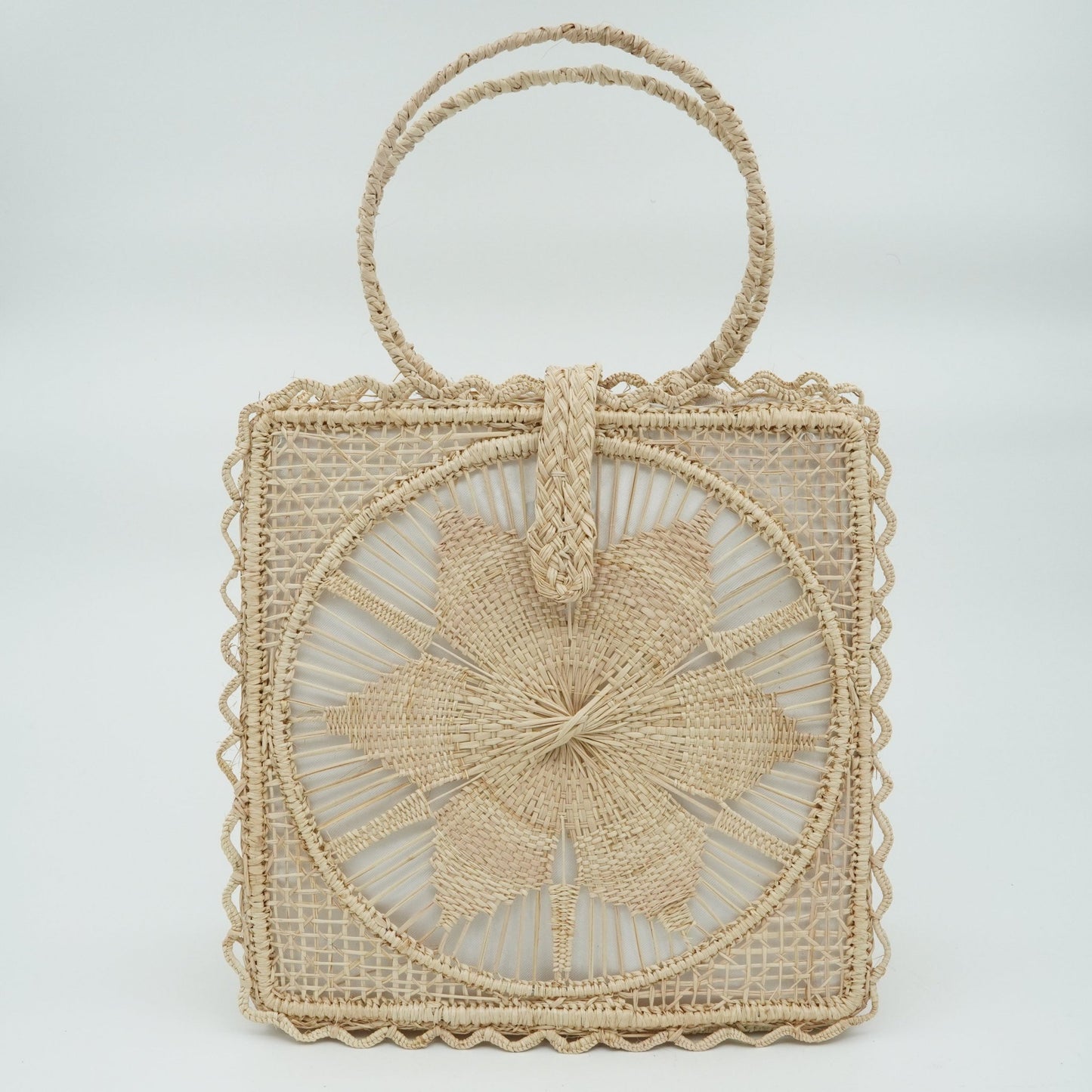Natural woven square flower purse.