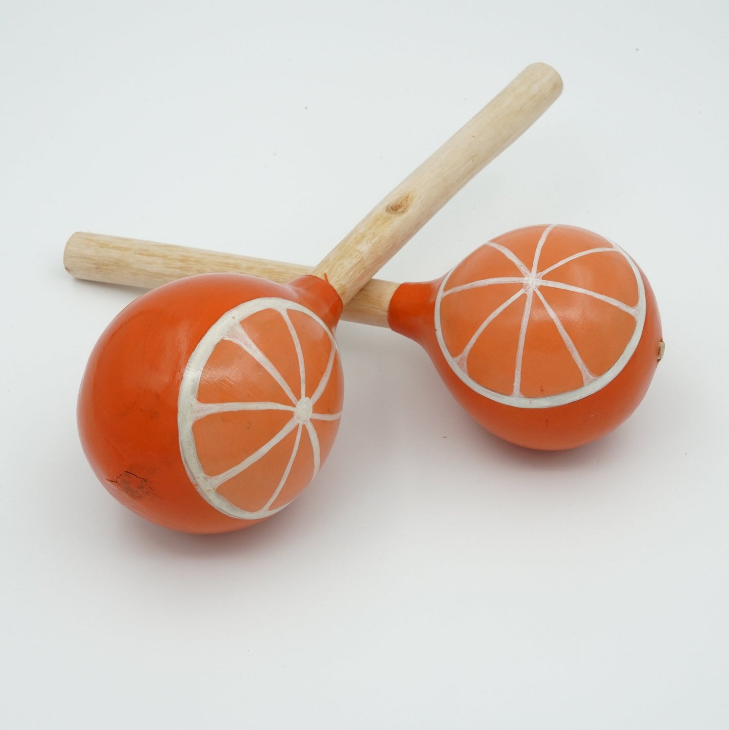 Pair of orange totumo maracas