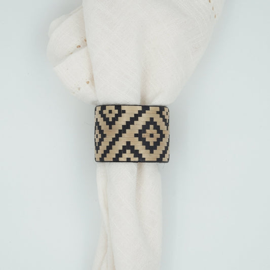Overhead view of woven paja tetera and chocolatillo napkin ring 1.
