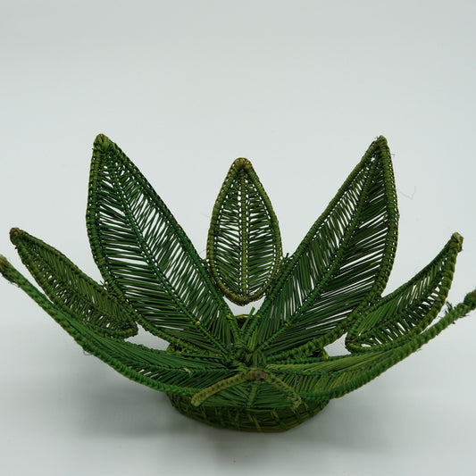 Head on view of small leaves woven basket.
