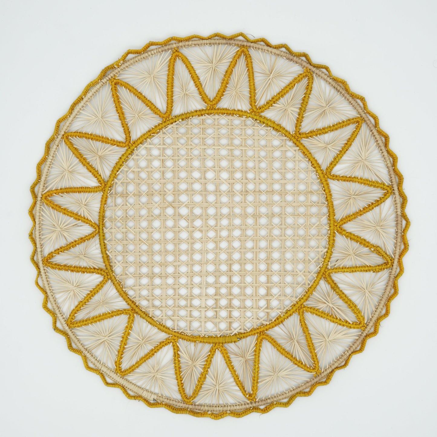 Overhead view of yellow woven triangle border placemat.