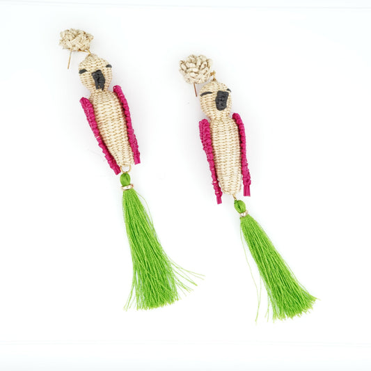 Overhead view of woven bird earrings.