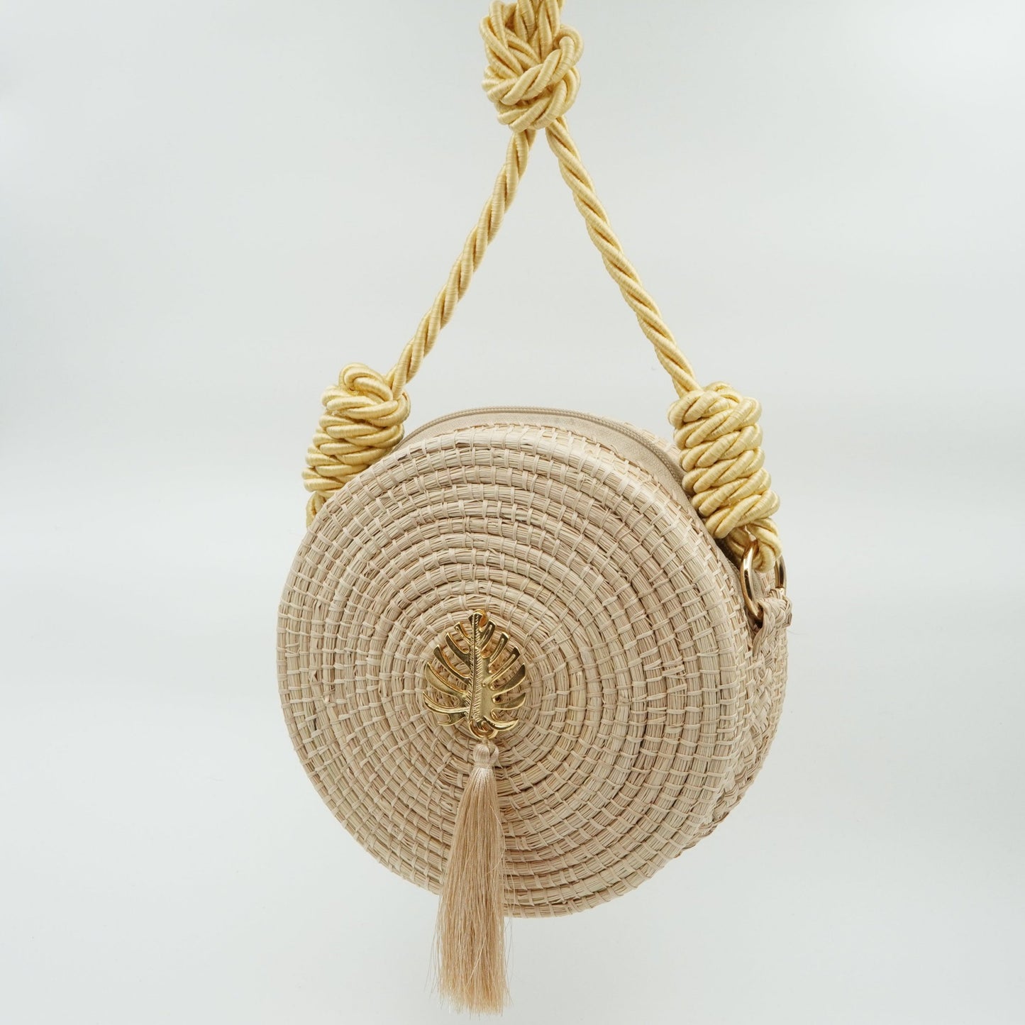 Woven yoyo purse with gold strap 2.