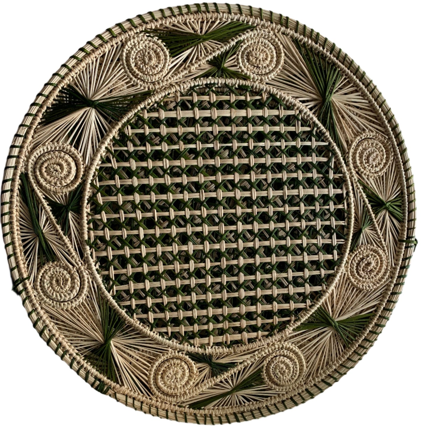 An overhead view of a woven placemat with a caracol (snail shell) pattern in natural and olive green.