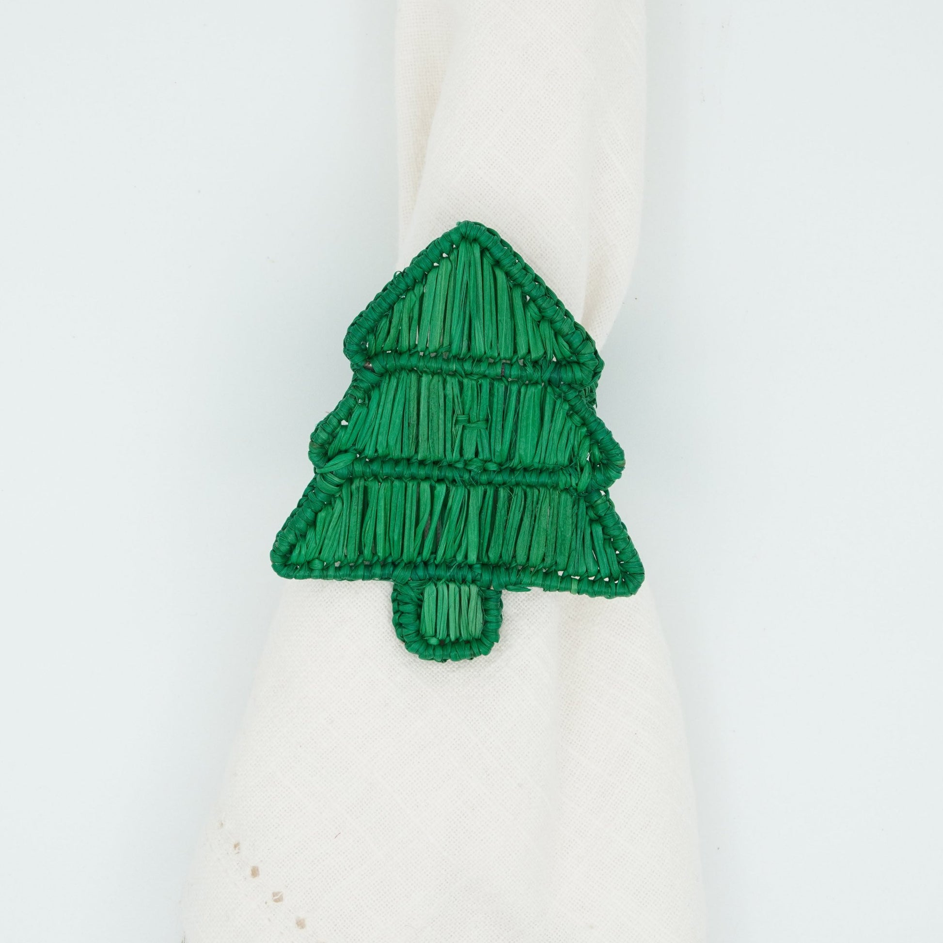Overhead view of woven Christmas tree napkin ring