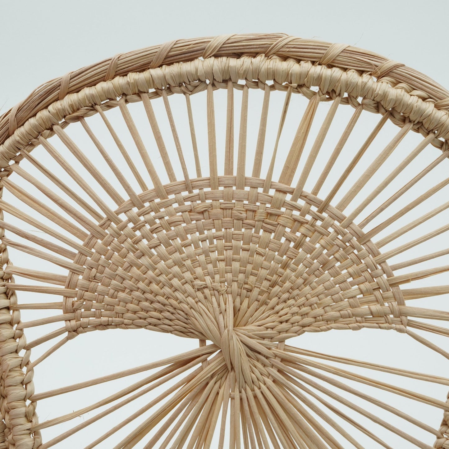 Close up view of woven fan basket.