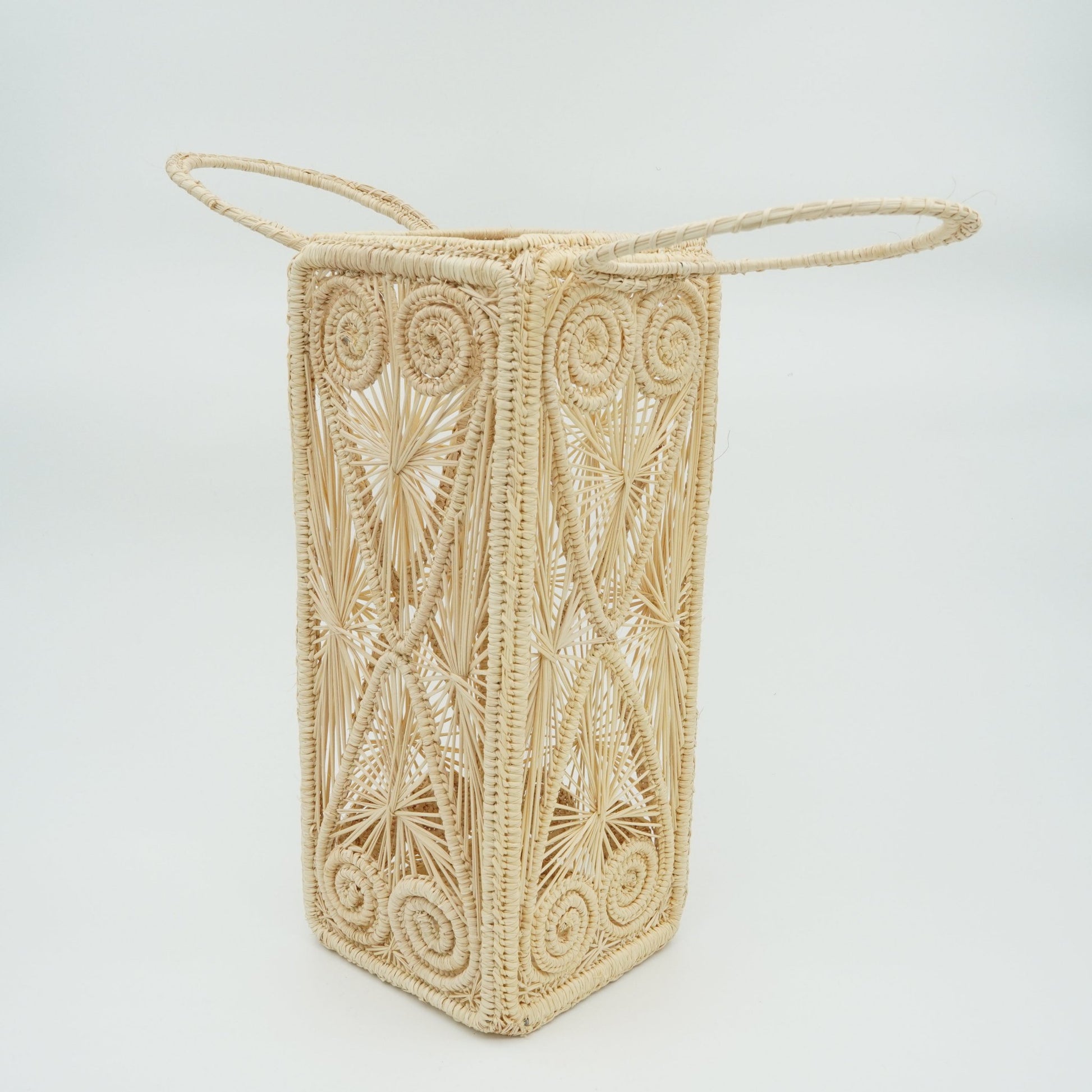 Head on view of heart square woven wine basket.