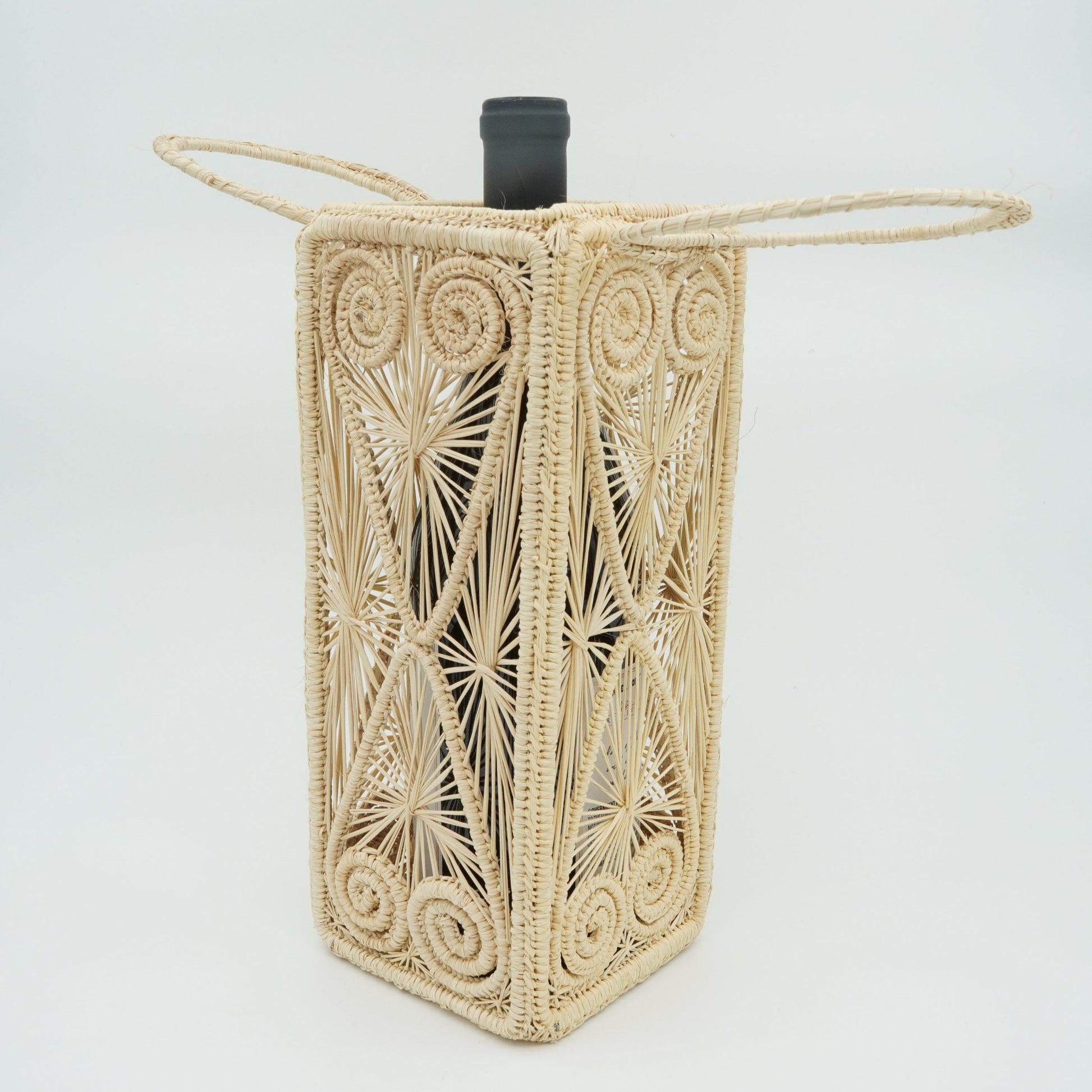 Head on view of heart square woven wine basket with wine.