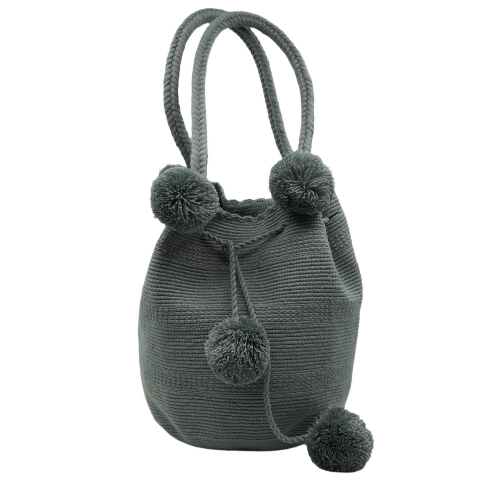 Large gray mochila woven handbag with pompoms.