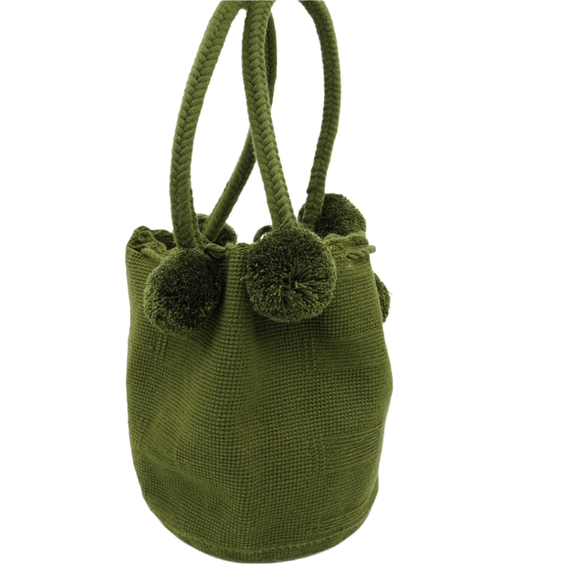 Large green mochila woven handbag with pompoms.