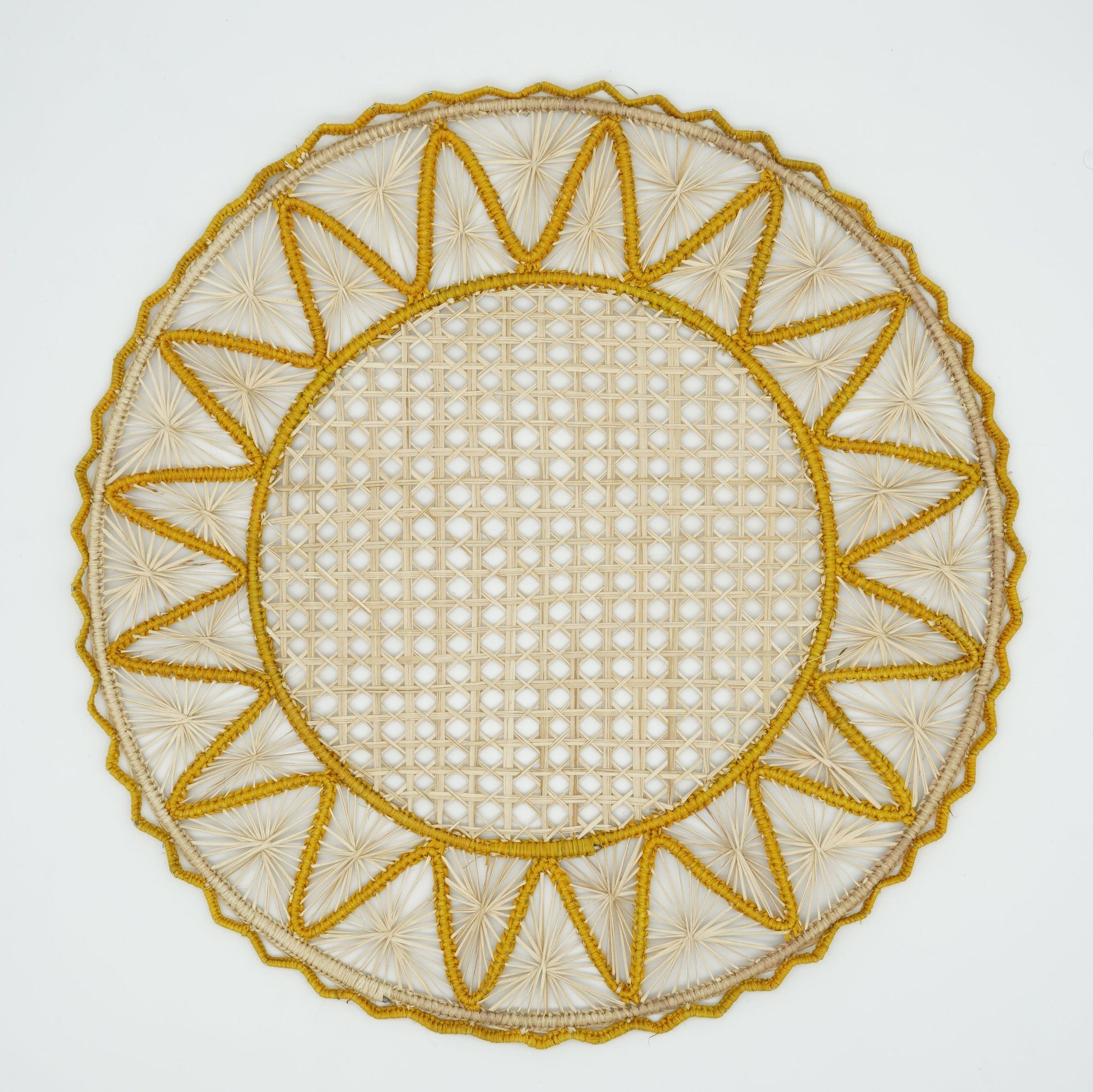 Overhead view of yellow woven triangle border placemat.